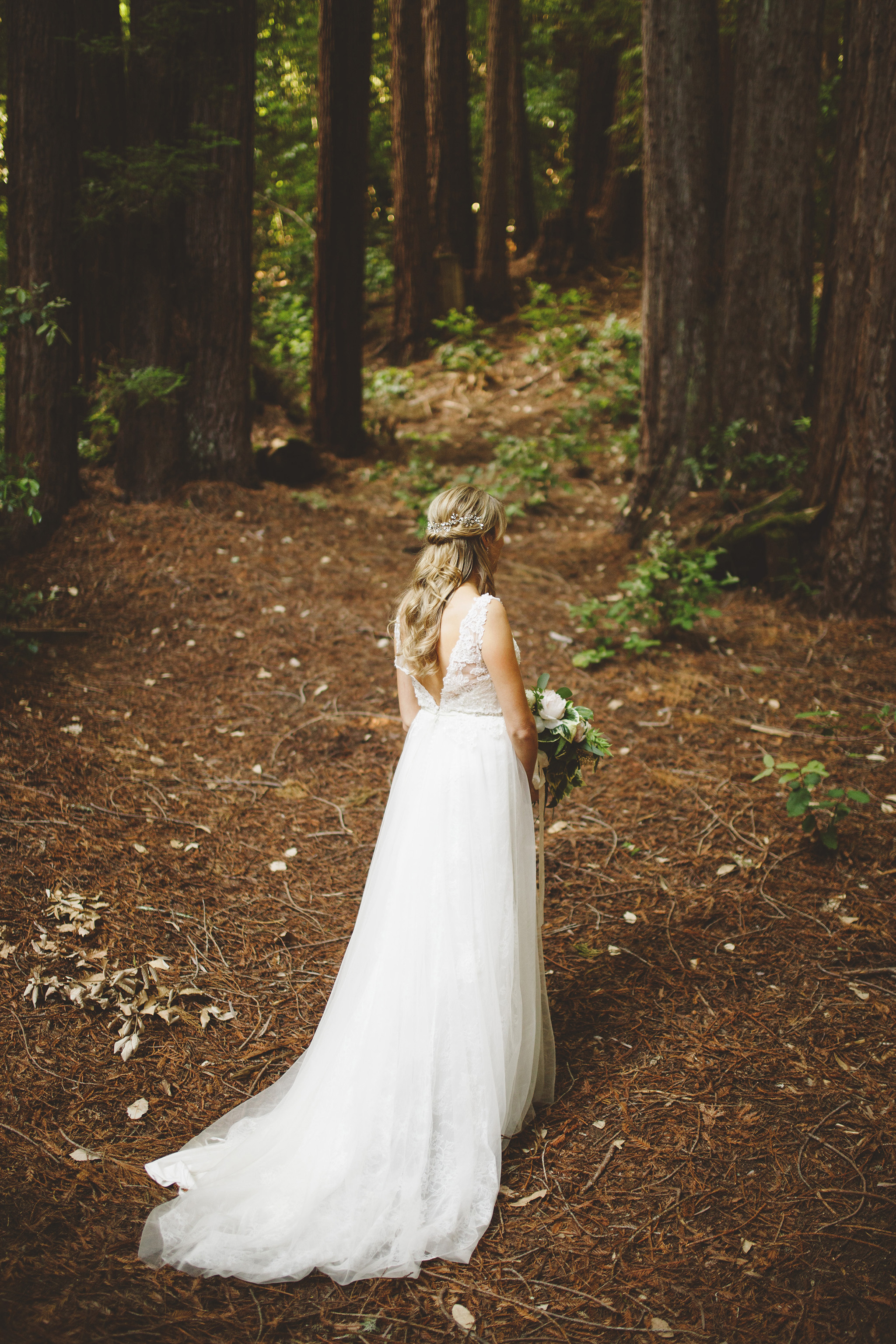 Bride in the redwoods at Waterfall Lodge and Retreat