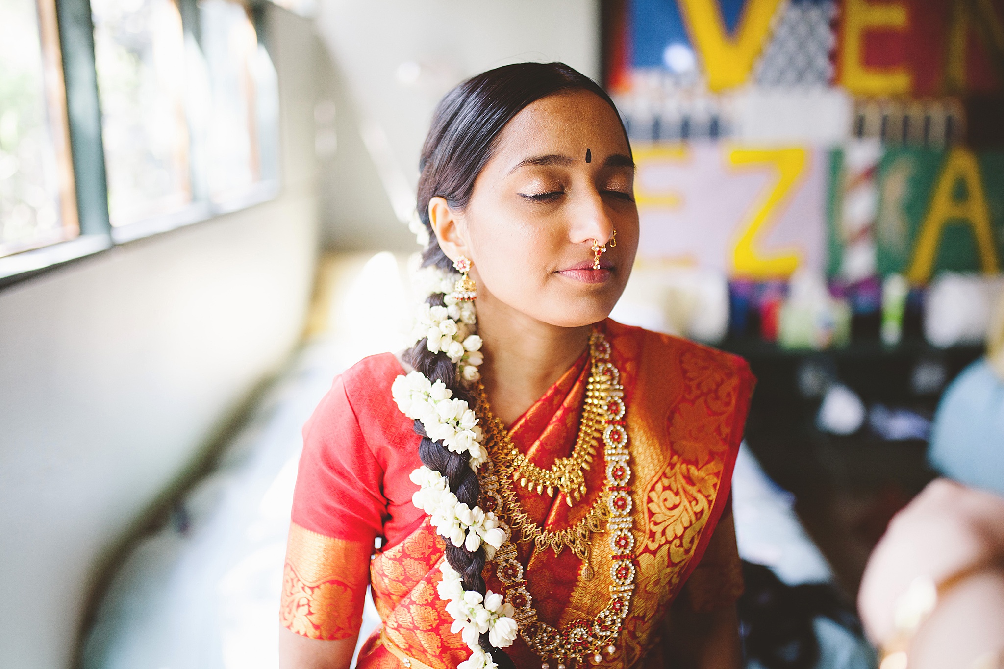 bride preparing for hindu wedding ceremony in california. 